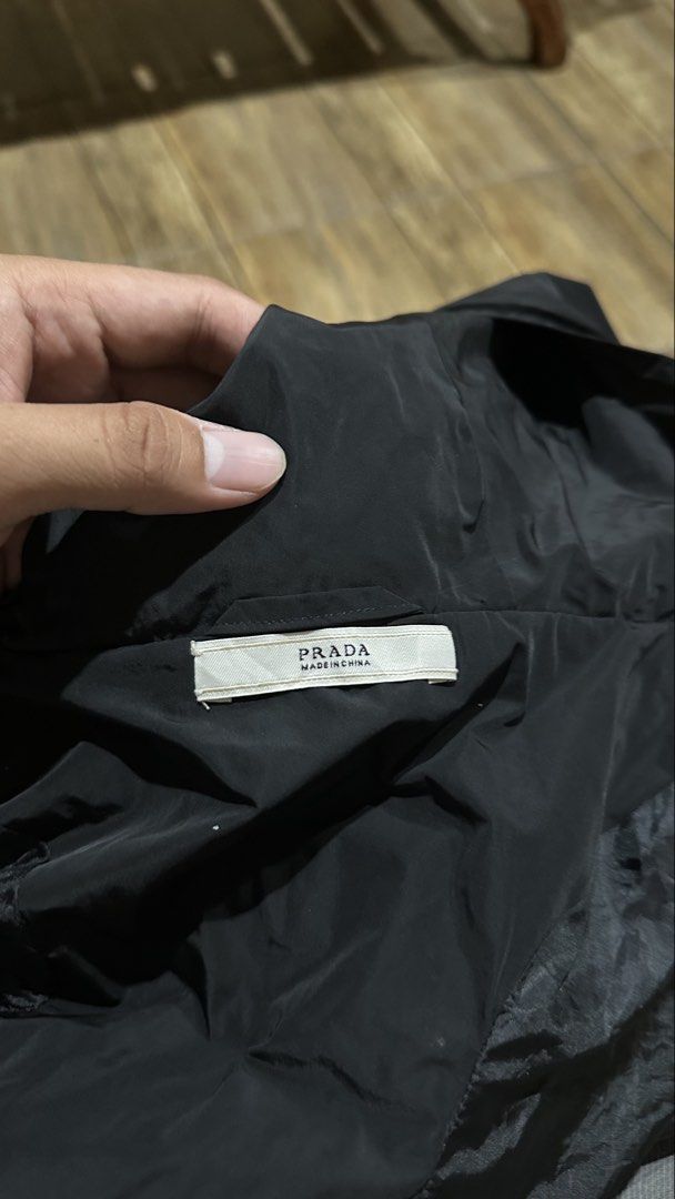 PRADA WINDBREAKER (Category: Coats, Jackets and Outerwear) located in Manila. Submitted by urban-vintage_2 (Listing ID 1467220175, Image 3). Description: ISSUE: ZIPPER , SEE THE PICS FOR ISSUE (NEED WASH) MOP :GCASH (NO COD) SHIP VIA: LALAMOVE & J&T LOCATION: PASIG CITY LENGTH: 22-23 WIDTH :21.