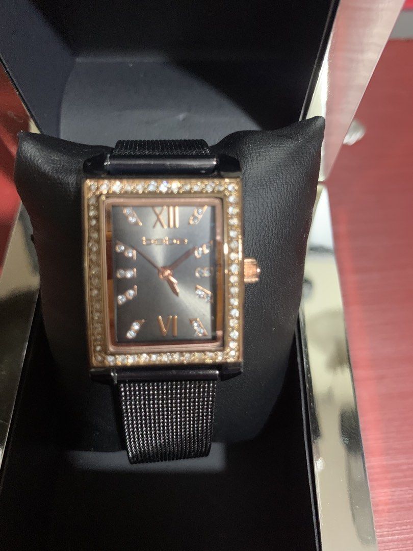 Preloved Bebe watch for women (Category: Women's Watches) located in General Trias. Submitted by vpshoppe (Listing ID 1467341392, Image 1). Description: Preloved Bebe watch for women mesh metal strap with elegant rhinestones medium faced black used once .