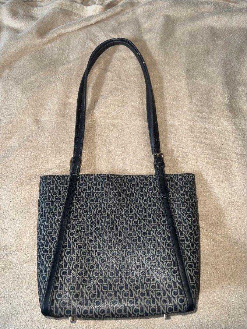 Preloved CLN Black Tote Bag (Category: Tote Bags) located in Castillejos. Submitted by syi_lah (Listing ID 1467175284, Image 2). Description: Preloved CLN bag in good condition. Originally bought for ₱2,499 at a physical store in Harbor. Still usable and spacious, perfect for everyday use. It has minimal white peeling/marks on the handles and some parts, as shown in the photos. Selling because decluttering. Pm for more details tysm.. Price + SF .