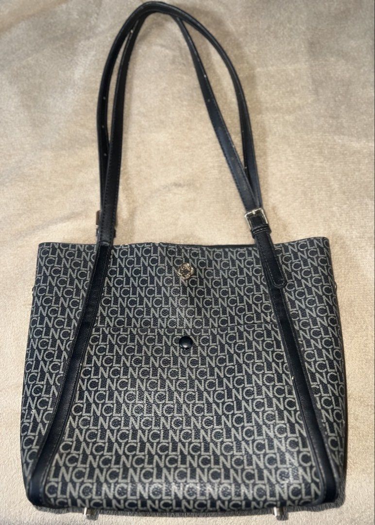Preloved CLN Black Tote Bag (Category: Tote Bags) located in Castillejos. Submitted by syi_lah (Listing ID 1467175284, Image 1). Description: Preloved CLN bag in good condition. Originally bought for ₱2,499 at a physical store in Harbor. Still usable and spacious, perfect for everyday use. It has minimal white peeling/marks on the handles and some parts, as shown in the photos. Selling because decluttering. Pm for more details tysm.. Price + SF .
