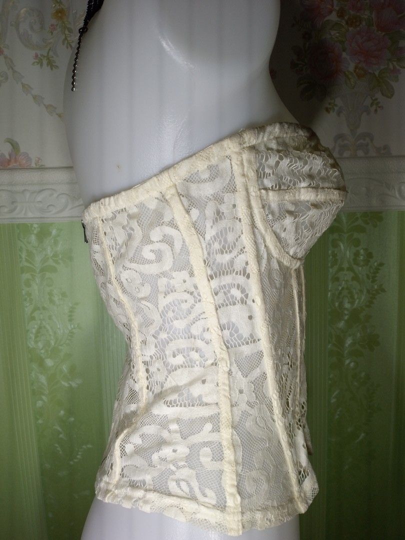 Preloved Prettylittlething Lace Corset Top (Category: Others Tops) located in Dasmarinas. Submitted by ms.happycorsets (Listing ID 1467315149, Image 3). Description: Preloved Lace Corset Top Cream Color Color Can Fit Medium size Starting waistline 29-30 inches only Bust size 36 inches for Cup B -C Not Padded bra No underwire No bra strap slot length 14 inches Stretchable Lace Fabric Has Zipper at the back Has Front 6 Soft bones with Slight flaws 