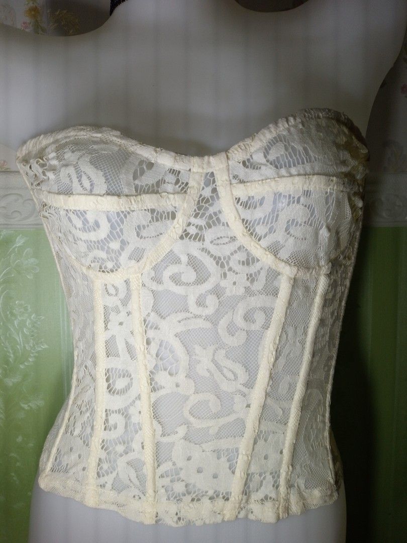 Preloved Prettylittlething Lace Corset Top (Category: Others Tops) located in Dasmarinas. Submitted by ms.happycorsets (Listing ID 1467315149, Image 2). Description: Preloved Lace Corset Top Cream Color Color Can Fit Medium size Starting waistline 29-30 inches only Bust size 36 inches for Cup B -C Not Padded bra No underwire No bra strap slot length 14 inches Stretchable Lace Fabric Has Zipper at the back Has Front 6 Soft bones with Slight flaws 