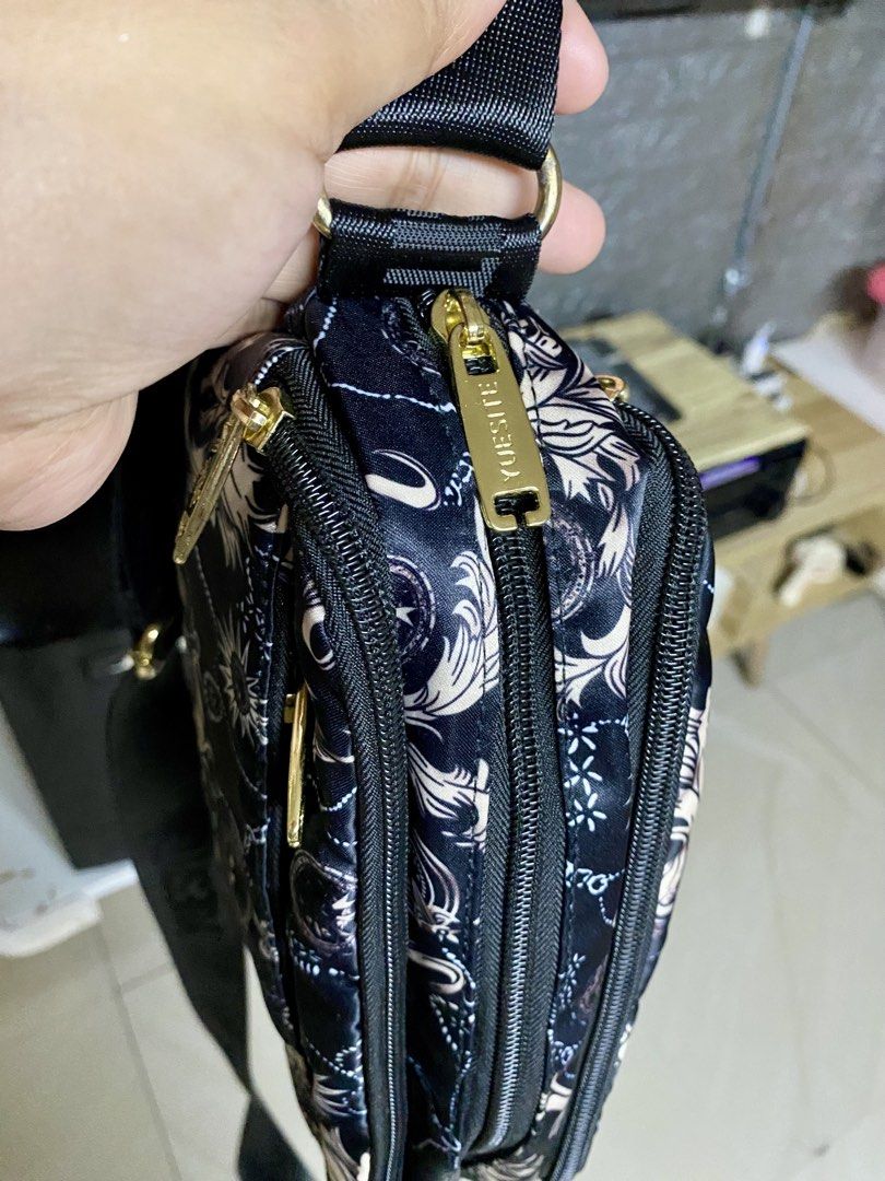 Preloved sling bag (Category: Cross-body Bags) located in Taguig. Submitted by mochis_collection (Listing ID 1467177840, Image 3). Description: Preloved Yuesite sling bag With 4 compartments Adjustable strap Perfect gamitin for everyday use Location: Taguig Open for pick up & delivery.