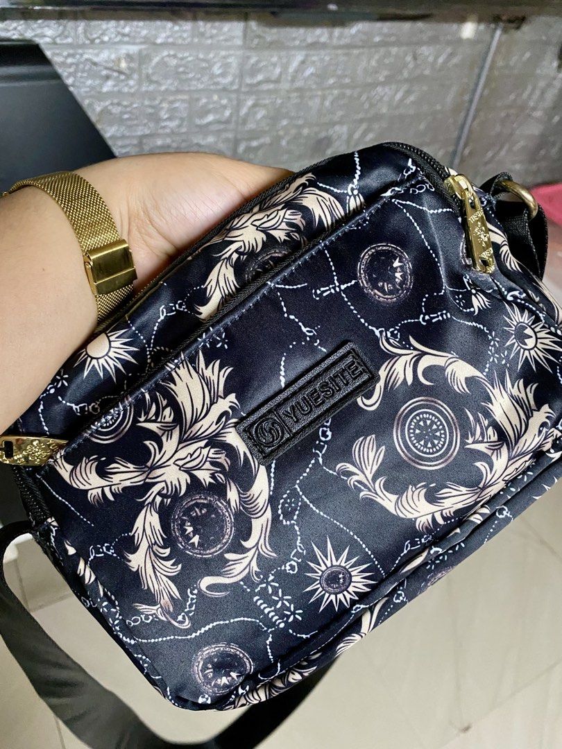 Preloved sling bag (Category: Cross-body Bags) located in Taguig. Submitted by mochis_collection (Listing ID 1467177840, Image 2). Description: Preloved Yuesite sling bag With 4 compartments Adjustable strap Perfect gamitin for everyday use Location: Taguig Open for pick up & delivery.