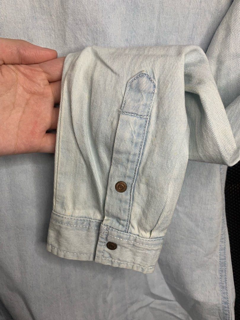 Pull&Bear Light Blue Denim Shirt Size S (Category: Shirts) located in Santa Rosa. Submitted by annydeclutters (Listing ID 1467206003, Image 3). Description: - Brand: Pull&Bear - Item: Denim shirt in light blue wash - Size: S - Details: Button-down front, classic collar, two chest pockets, and button cuffs - Condition: Pre-owned with a couple of small, faint stains near the pocket and shoulder area (kindly check photos closely before buying).