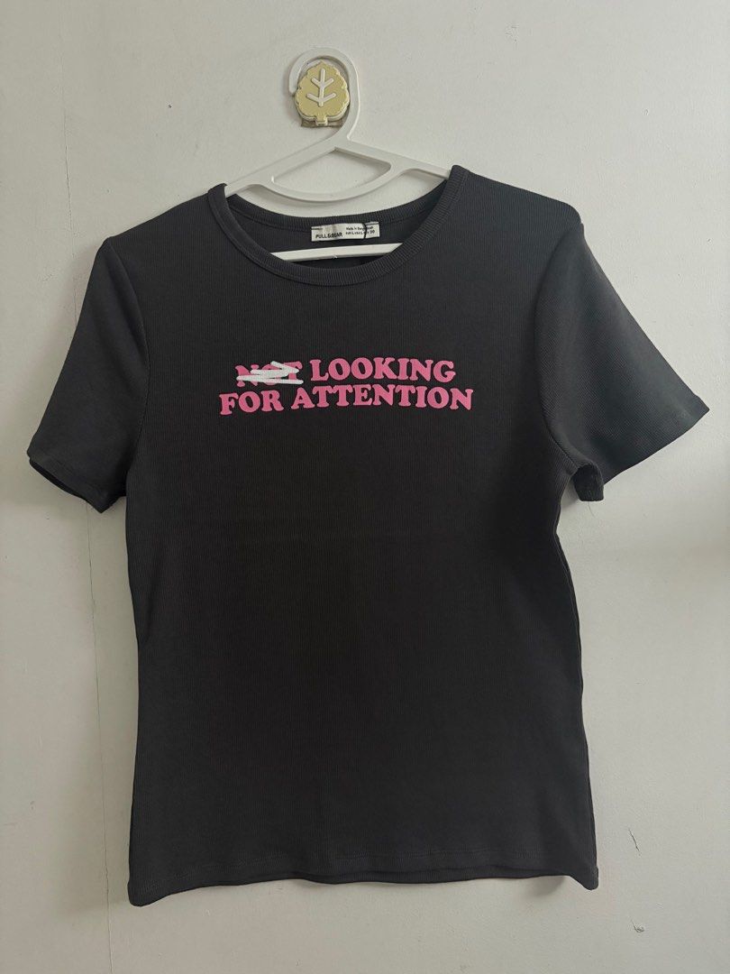 Pull&Bear Not Looking For Attention Black T-Shirt (Category: Shirts) located in Quezon City. Submitted by geminiselection (Listing ID 1467345182, Image 1). Description: - brandnew - medium- xl, very stretchy.