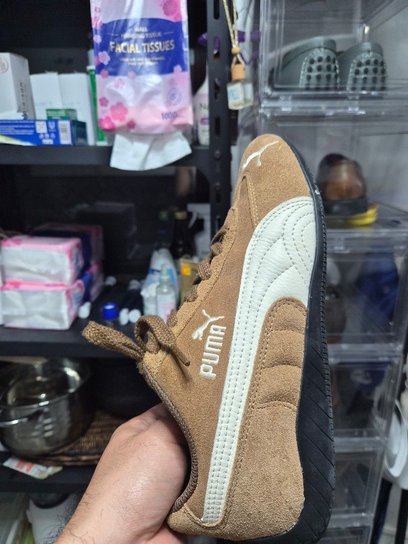 Puma Brown Suede Sneakers Size US 9 (Category: Sneakers) located in Angeles City. Submitted by marvinjbm110069 (Listing ID 1467319759, Image 2). Description: - Brand/Model: Puma Sneakers - Material: Brown suede with white branding details - Comfort: OrthoLite insoles for extra cushioning - Design: Thick brown laces and dark rubber soles - Size: US 9, UK 6.5, EUR 40 (255mm) - Origin: Made in Vietnam - Condition: Clean overall used once rfs. wrong 