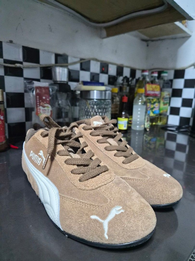 Puma Brown Suede Sneakers Size US 9 (Category: Sneakers) located in Angeles City. Submitted by marvinjbm110069 (Listing ID 1467319759, Image 1). Description: - Brand/Model: Puma Sneakers - Material: Brown suede with white branding details - Comfort: OrthoLite insoles for extra cushioning - Design: Thick brown laces and dark rubber soles - Size: US 9, UK 6.5, EUR 40 (255mm) - Origin: Made in Vietnam - Condition: Clean overall used once rfs. wrong 