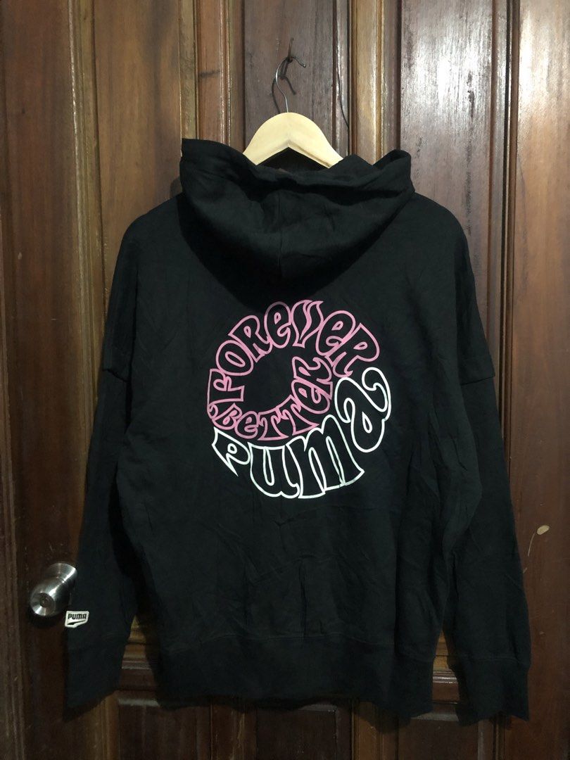 Puma Forever Better Black Zip-Up Hoodie (Category: Coats, Jackets and Outerwear) located in Quezon City. Submitted by yeahsource222 (Listing ID 1467242152, Image 2). Description: Black full-zip hoodie from Puma. Features 'Forever Better Puma' graphic circular print on front chest and large on the back. Drawstring hood, front kangaroo pocket, ribbed cuffs and hem. Style number 531602-01. Original store tags still attached. Never worn..