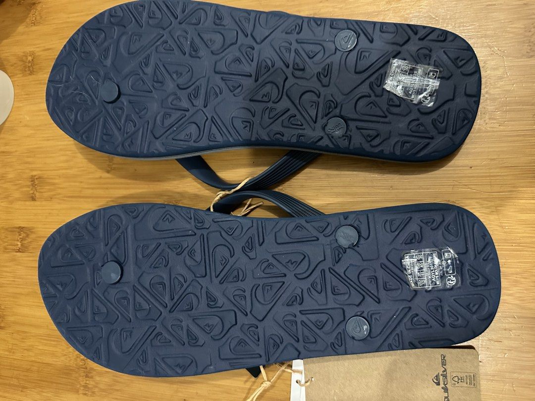 Quicksilver Flip-Flops Men's US12|30cm | casual beach setting (Category: Slippers & Slides) located in Manila. Submitted by bessmarvin (Listing ID 1467302378, Image 2). Description: Quicksilver Flip Flops Men's 12 or 30cm | ZEN Staycation - beach life.