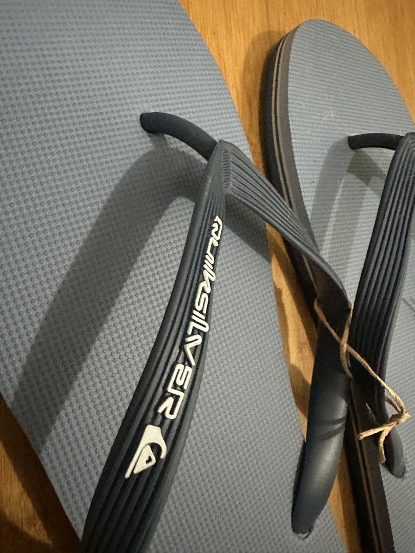 Quicksilver Flip-Flops Men's US12|30cm | casual beach setting (Category: Slippers & Slides) located in Manila. Submitted by bessmarvin (Listing ID 1467302378, Image 1). Description: Quicksilver Flip Flops Men's 12 or 30cm | ZEN Staycation - beach life.