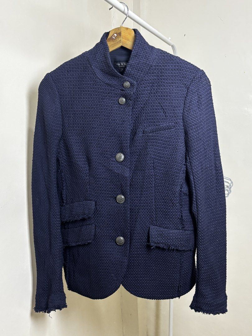 Rag & Bone New York Navy Blue Textured Jacket Size 4 (Category: Coats, Jackets and Outerwear) located in Ajuy. Submitted by galitsabarat (Listing ID 1467359520, Image 1). Description: - Brand: Rag & Bone New York - Size: 4 - Color: Dark Navy Blue - Material: 58% polyamide, 37% cotton, 5% polyester (Textured knit, lined interior) - Design: Stand collar, front button closure - Details: Frayed raw edge hems and cuffs, multiple flap pockets, single c