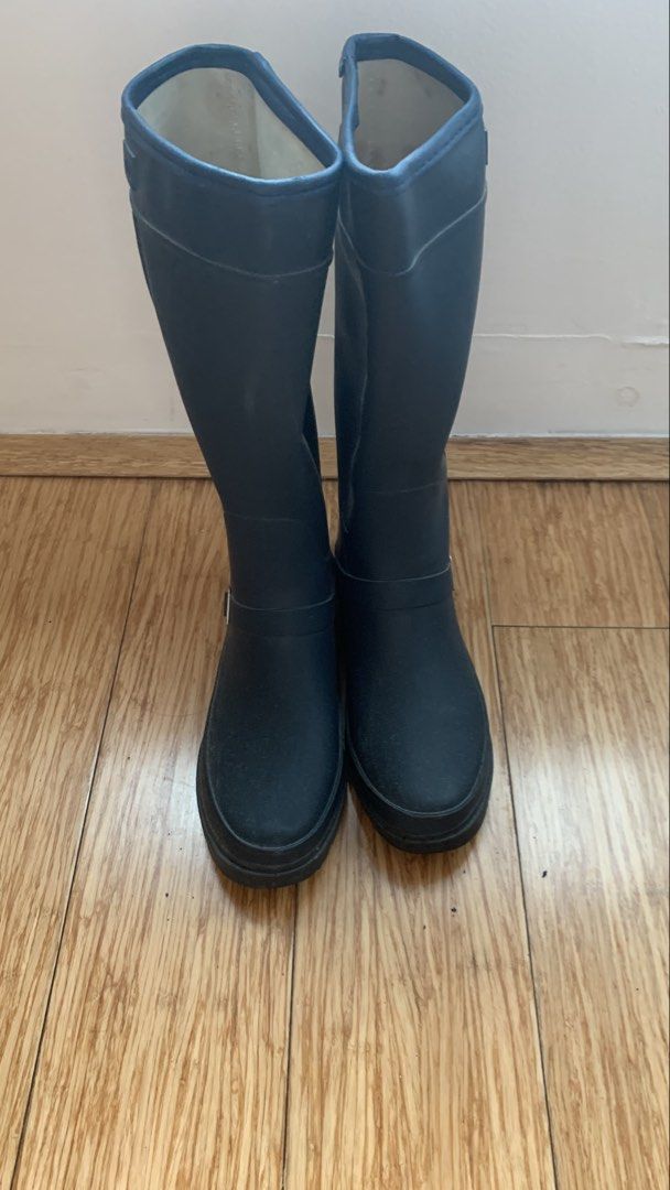 Rain Boots | Blue | Size 24.5 CM (Category: Boots) located in Quezon City. Submitted by garagesalehomecafe (Listing ID 1467203081, Image 2). Description: - Color: Dark blue - Style: Knee-high rain boots with side buckle detail - Soles: Deep tread pattern for anti-slip grip - Size: 24.5CM Inner lining has some discoloration. Soles have light dirt. Bought from Japan. RFS: decluttering.