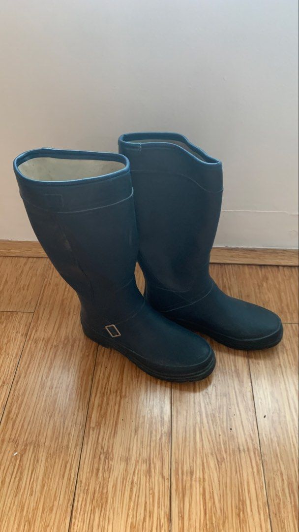 Rain Boots | Blue | Size 24.5 CM (Category: Boots) located in Quezon City. Submitted by garagesalehomecafe (Listing ID 1467203081, Image 1). Description: - Color: Dark blue - Style: Knee-high rain boots with side buckle detail - Soles: Deep tread pattern for anti-slip grip - Size: 24.5CM Inner lining has some discoloration. Soles have light dirt. Bought from Japan. RFS: decluttering.
