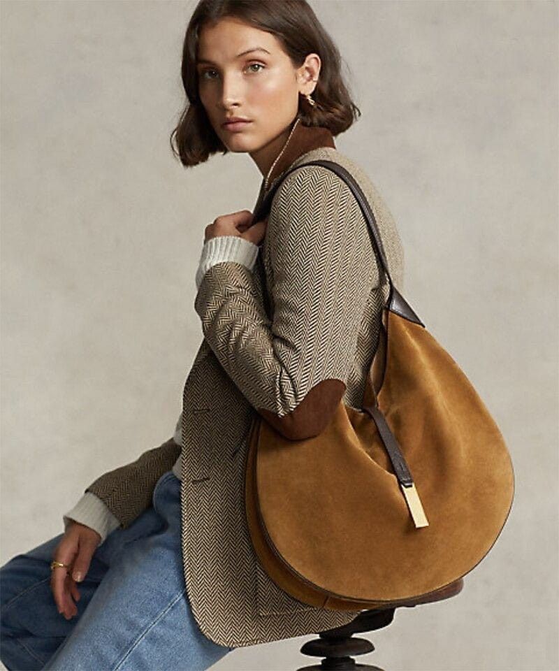 Ralph Lauren Polo Suede Shoulder Bag (Category: Shoulder Bags) located in Paoay. Submitted by rvf1230 (Listing ID 1467317951, Image 1). Description: - Brand: Polo Ralph Lauren - Material: Rich brown suede with dark leather trim - Strap: Adjustable dark leather strap - Closure & Details: Front flap strap with gold-toned logo plaque - Interior: Roomy with one zippered pocket and slip pockets - Inclusion: Original dust bag included - Condition: Exce