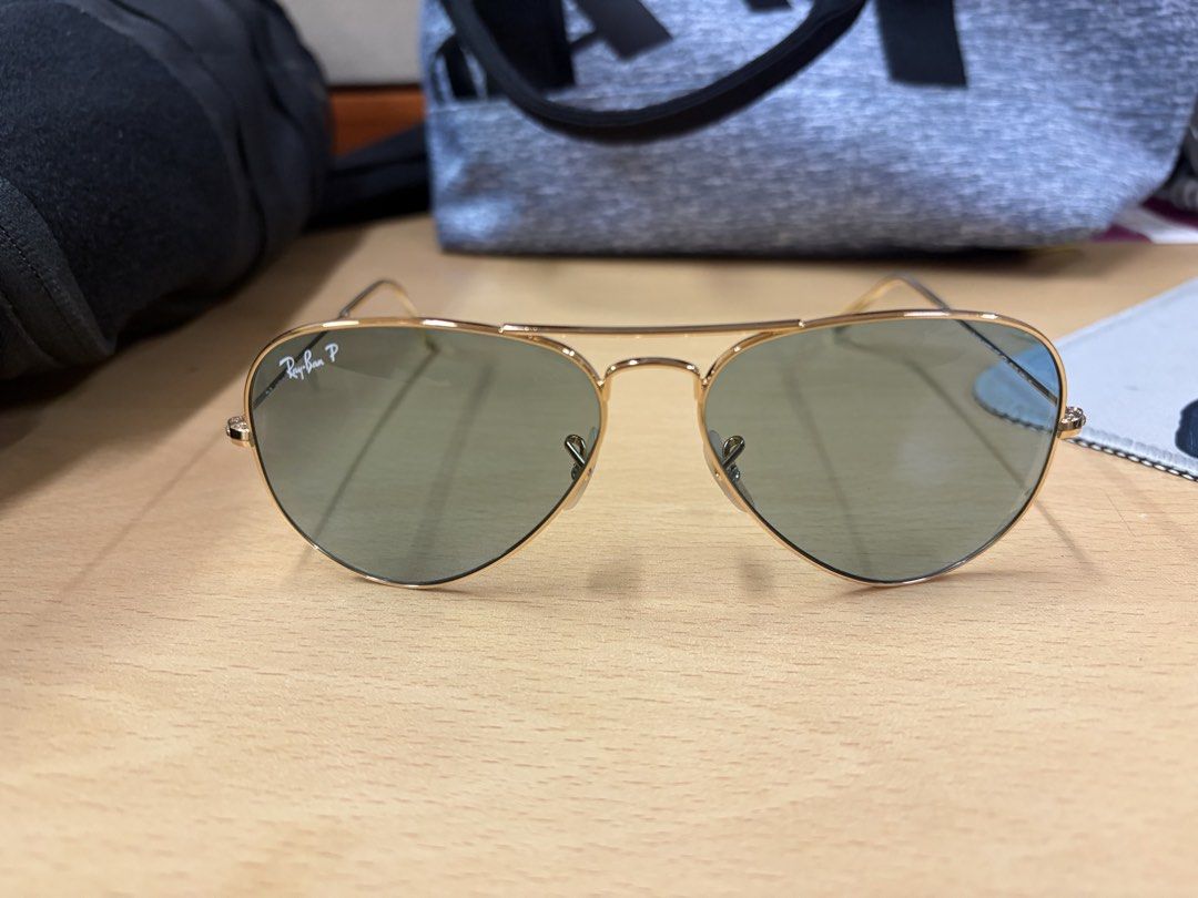 Ray-Ban Aviator Classic Polarized Sunglasses Gold Frame (Category: Sunglasses & Eyewear) located in Makati City. Submitted by chumamba (Listing ID 1467362042, Image 2). Description: Barely used Rayban aviator Polarized Comes with: Case Micro cloth Eyewear Slight lens peel but barely noticeable. .