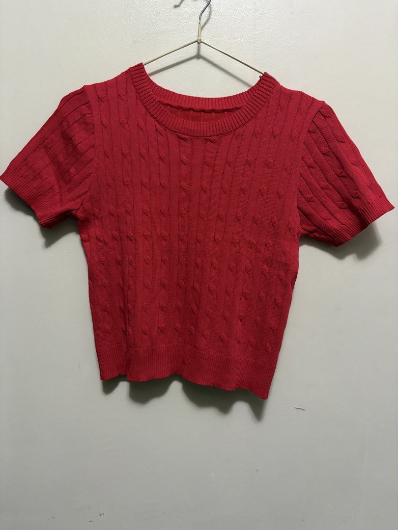Red Cable Knit Short Sleeve Crop Top (Category: Blouses) located in Quezon City. Submitted by j.steffy (Listing ID 1467322657, Image 1). Description: - Color: Bright red - Style: Cropped and fitted short-sleeve knit top - Neckline: Classic round neck - Design: All-over vertical cable knit pattern - Details: Ribbed collar, cuffs, and hem for a snug fit.