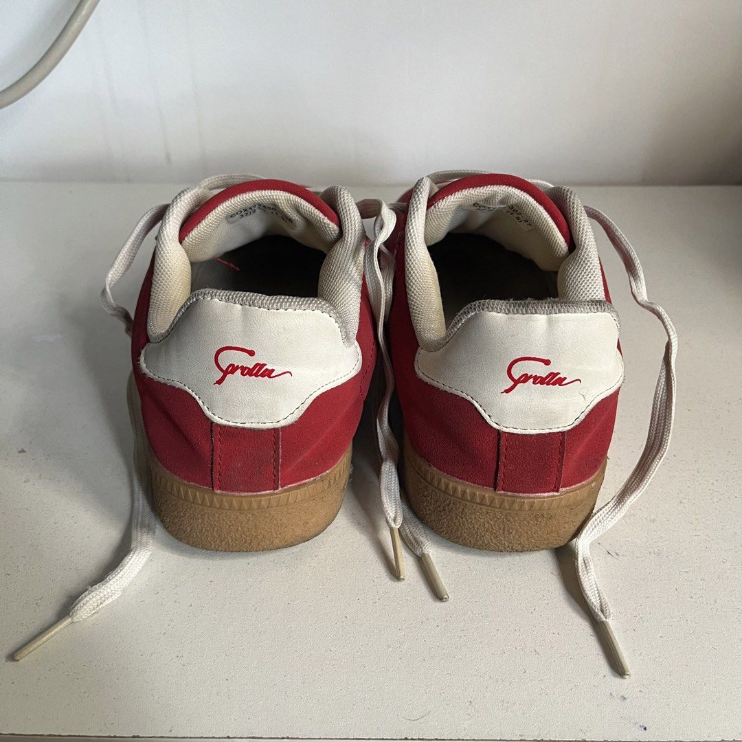 Red Corolla Shoes (Category: Sneakers) located in Caloocan City. Submitted by iamqwertyy (Listing ID 1467176218, Image 2). Description: - Size: 37 - Color/Design: Red suede with white stripes, white heel tab, and red script logo - Soles: Classic gum rubber - Condition: Uppers are in solid shape; shows light wear on the inner lining and laces - Style: Comfortable low-profile skate or casual walking sneakers.
