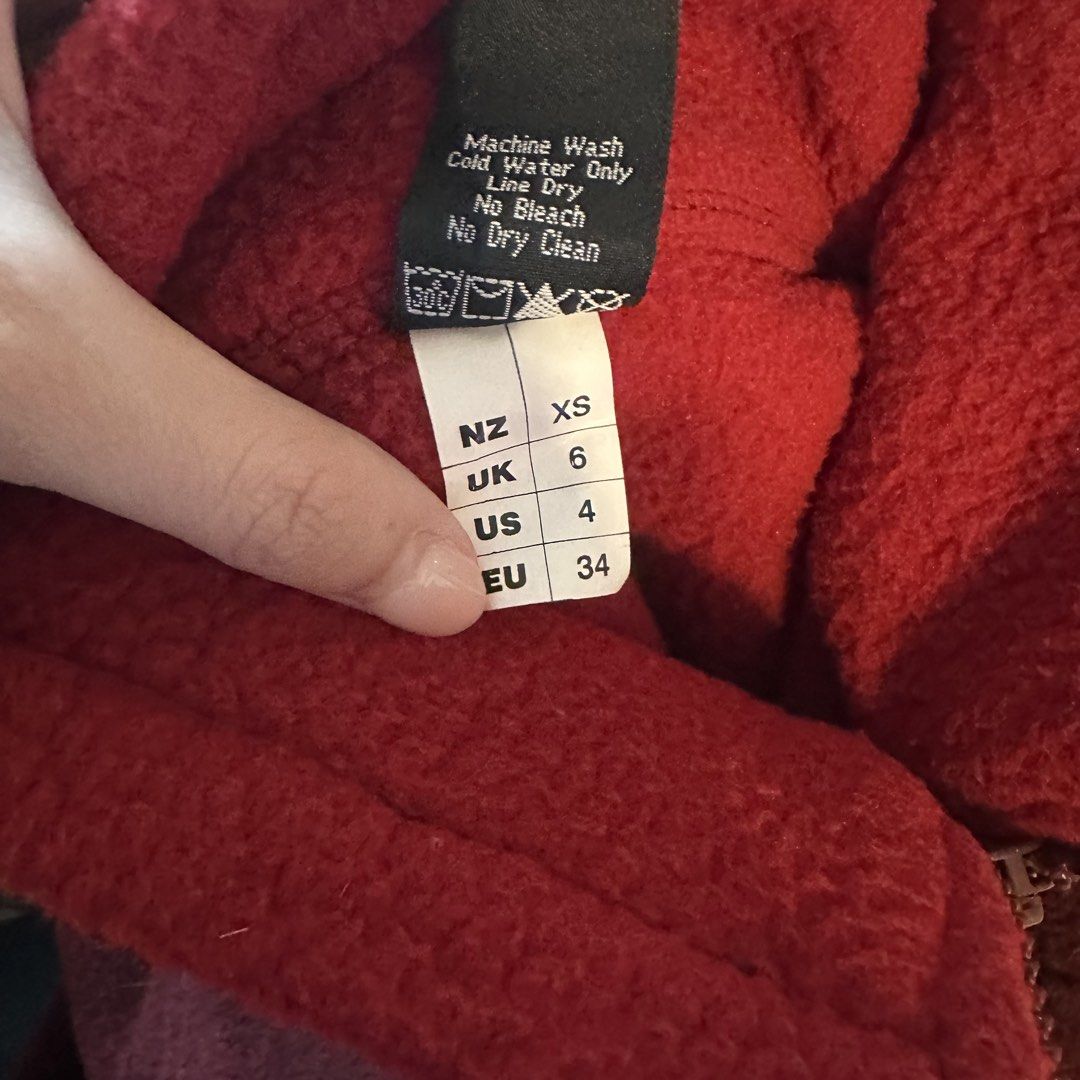 Red fleece jacket (Category: Coats, Jackets and Outerwear) located in Pasig City. Submitted by ynahperez (Listing ID 1467308765, Image 2). Description: Fits up to S/M.