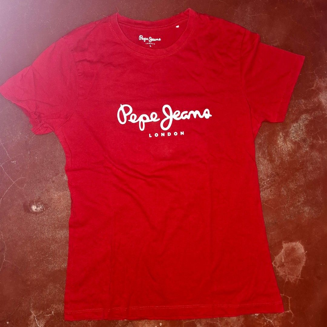 Red shirt (Category: Shirts) located in Adams. Submitted by frog_and_clover (Listing ID 1467314242, Image 1). Description: pepe jeans red shirt. can fit small to medium. good condition what you see is what you get.