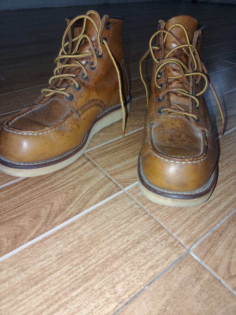 Red Wing 875 Moc Toe Leather Boots US 7 (Category: Boots) located in Quezon City. Submitted by cloudstrife30 (Listing ID 1467259512, Image 3). Description: Red Wing Heritage 875 Moc Toe boots in Oro-iginal leather. USA made, dated 02/10. Size US 7E, UK 6, EUR 39, CM 25. Classic wedge sole, Goodyear welt construction. Natural patina and wear marks on the leather uppers. Original yellow and brown taslan laces included..
