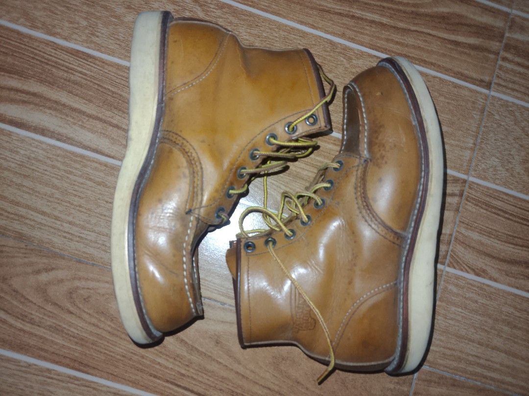 Red Wing 875 Moc Toe Leather Boots US 7 (Category: Boots) located in Quezon City. Submitted by cloudstrife30 (Listing ID 1467259512, Image 2). Description: Red Wing Heritage 875 Moc Toe boots in Oro-iginal leather. USA made, dated 02/10. Size US 7E, UK 6, EUR 39, CM 25. Classic wedge sole, Goodyear welt construction. Natural patina and wear marks on the leather uppers. Original yellow and brown taslan laces included..