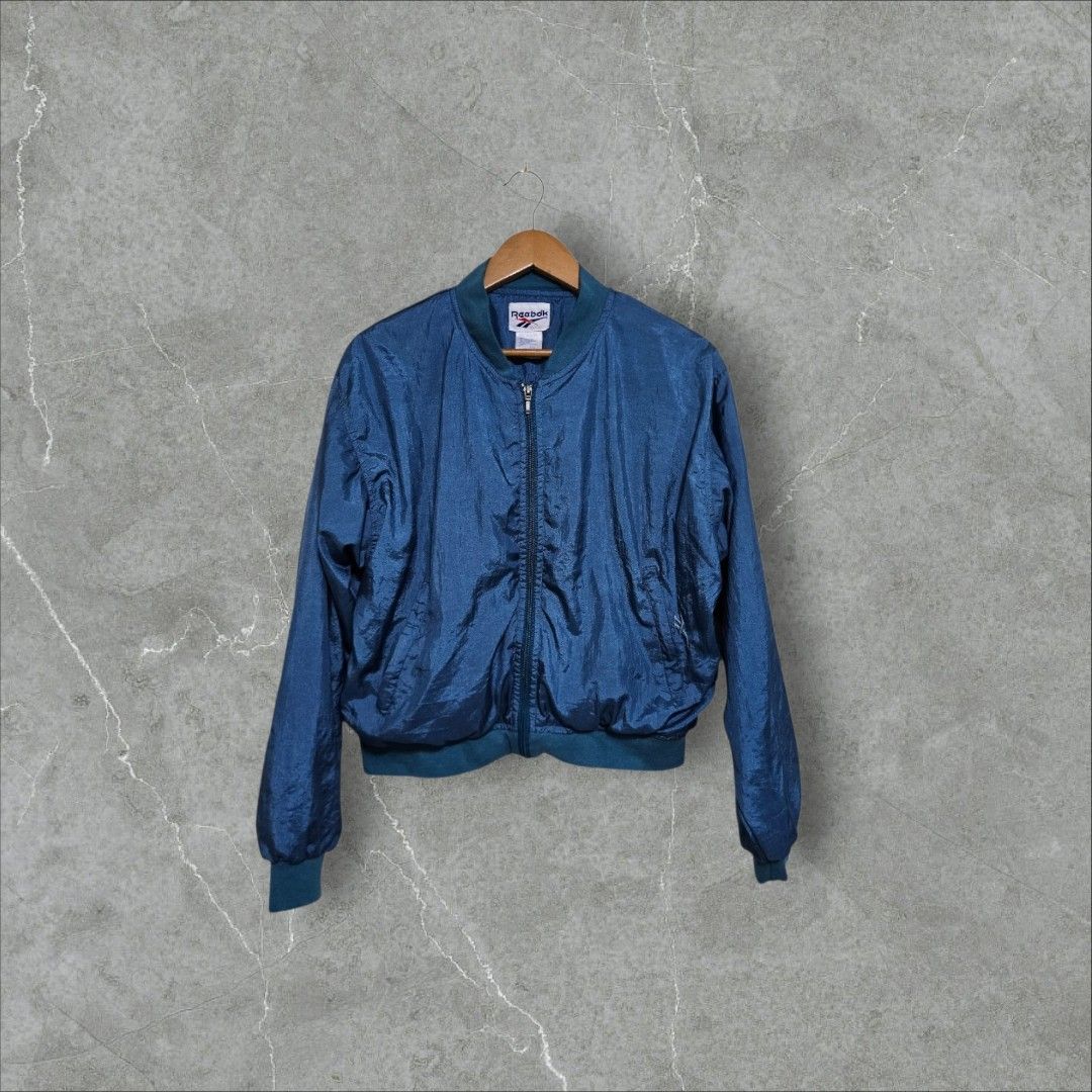 Reebok womens bomber jacket (Category: Coats, Jackets and Outerwear) located in Baguio. Submitted by fadexquisite (Listing ID 1467170376, Image 1). Description: Reebok womens bomber jacket Med wmns 23x21 Excellent condition 400 plus ship fee.