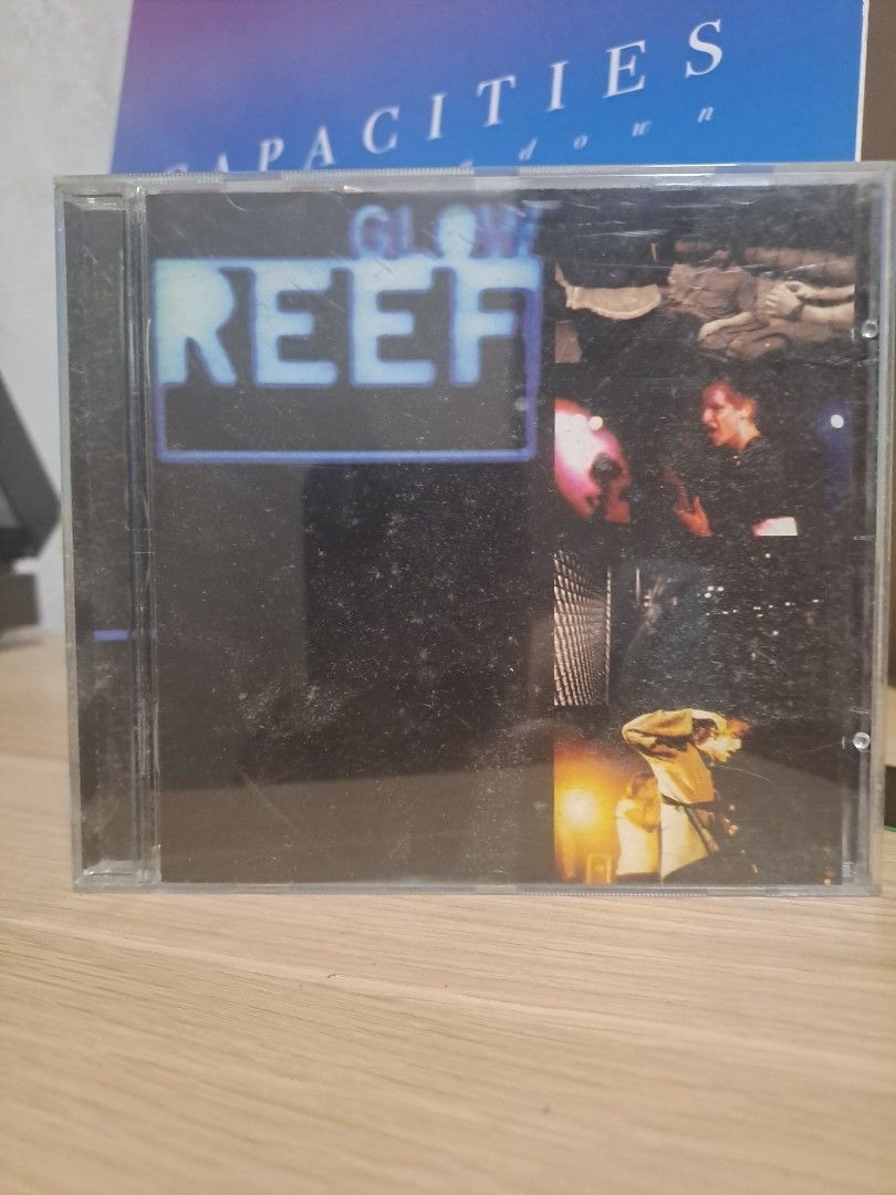Reef Glow CD Album (Category: CDs & DVDs) located in Las Pinas. Submitted by cobieshop (Listing ID 1467320525, Image 1). Description: - Item: Reef Glow 90s Alternative Rock Music CD - Format: Standard jewel case with cover art (band photos and blue logo) - Condition: Jewel case has minor dust and surface wear from storage; disc plays great - Genre: 90s rock and alternative - Perfect addition for music collectors and 90s rock fans.