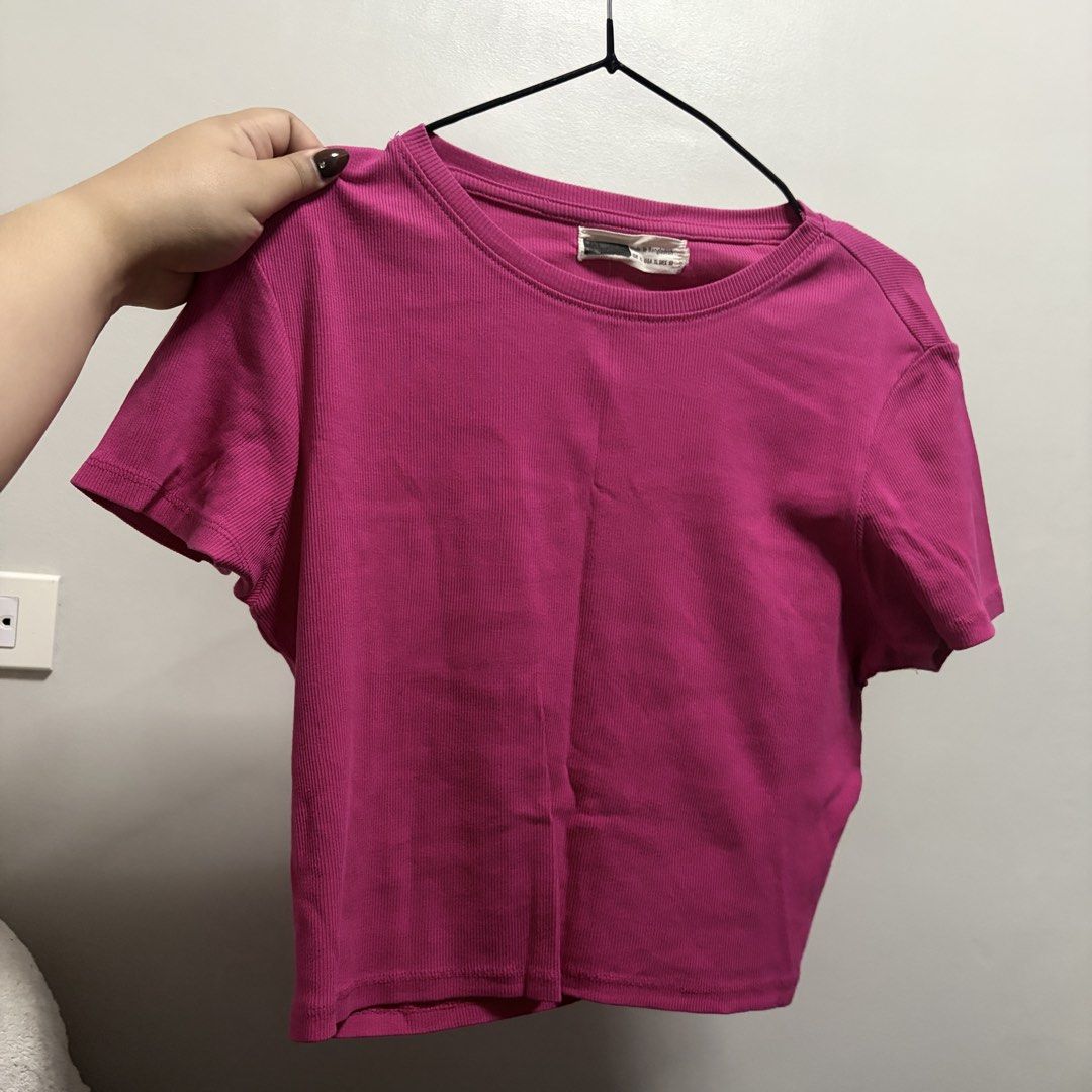 Ribbed Crop Tops Bundle (Category: Shirts) located in Tanza. Submitted by iamdhana (Listing ID 1467309831, Image 2). Description: Very stretchable, plus size Semicropped 60 pesos each Take all 10 pcs for 500 - Brand: Pull&Bear - Quantity: Bundle of 10 ribbed crop tees - Colors: Pink striped, bright pink, green, beige, and darker pink - Design: Crew neck and short sleeves - Material: Comfortable stretch fabric - Style: Versatile basics, perfect to