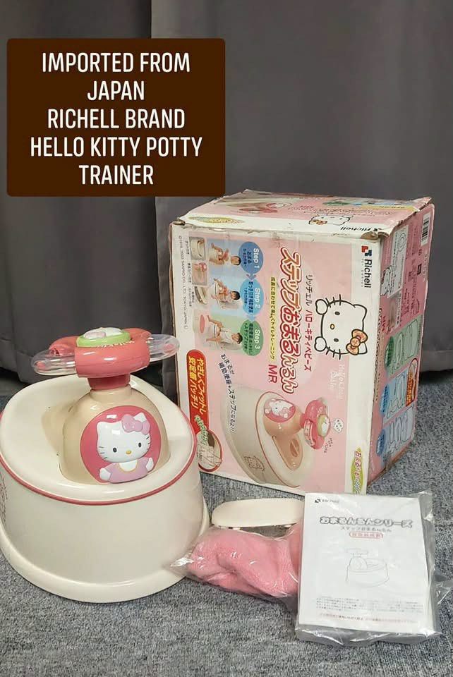 Richell Hello Kitty Potty Trainer Japan Import (Category: Toilet Training) located in Manila. Submitted by janetecson05 (Listing ID 1467198657, Image 1). Description: - Authentic Richell brand Kitty potty training set imported from Japan - Complete set: pink training base, handle attachment with rattle beads, and plush pink seat cover - Includes original box and instruction manual in plastic - Multi-stage design grows with your toddler - Clean co