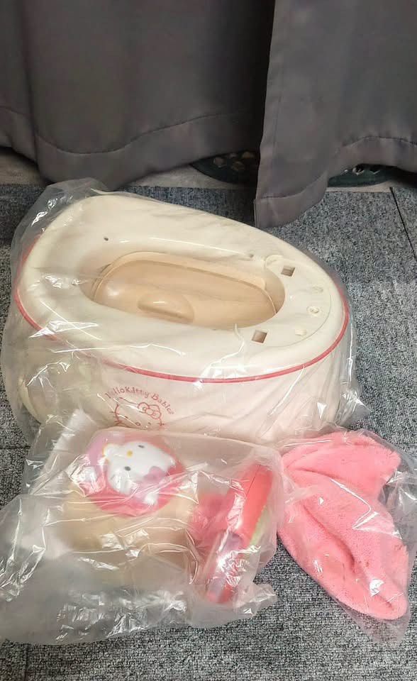 Richell Hello Kitty Potty Trainer Japan Import (Category: Toilet Training) located in Manila. Submitted by janetecson05 (Listing ID 1467198657, Image 2). Description: - Authentic Richell brand Kitty potty training set imported from Japan - Complete set: pink training base, handle attachment with rattle beads, and plush pink seat cover - Includes original box and instruction manual in plastic - Multi-stage design grows with your toddler - Clean co