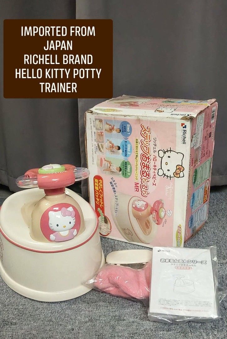 Richell Hello Kitty Potty Trainer Japan Import (Category: Toilet Training) located in Valenzuela. Submitted by gracebacot17959 (Listing ID 1467210832, Image 1). Description: - Authentic Richell Kitty potty trainer, imported directly from Japan - Features a cute pink and beige color scheme with adorable Sanrio graphics - Multi-step design grows with your toddler for easy toilet training - Complete with handlebars for extra safety and comfort - Com