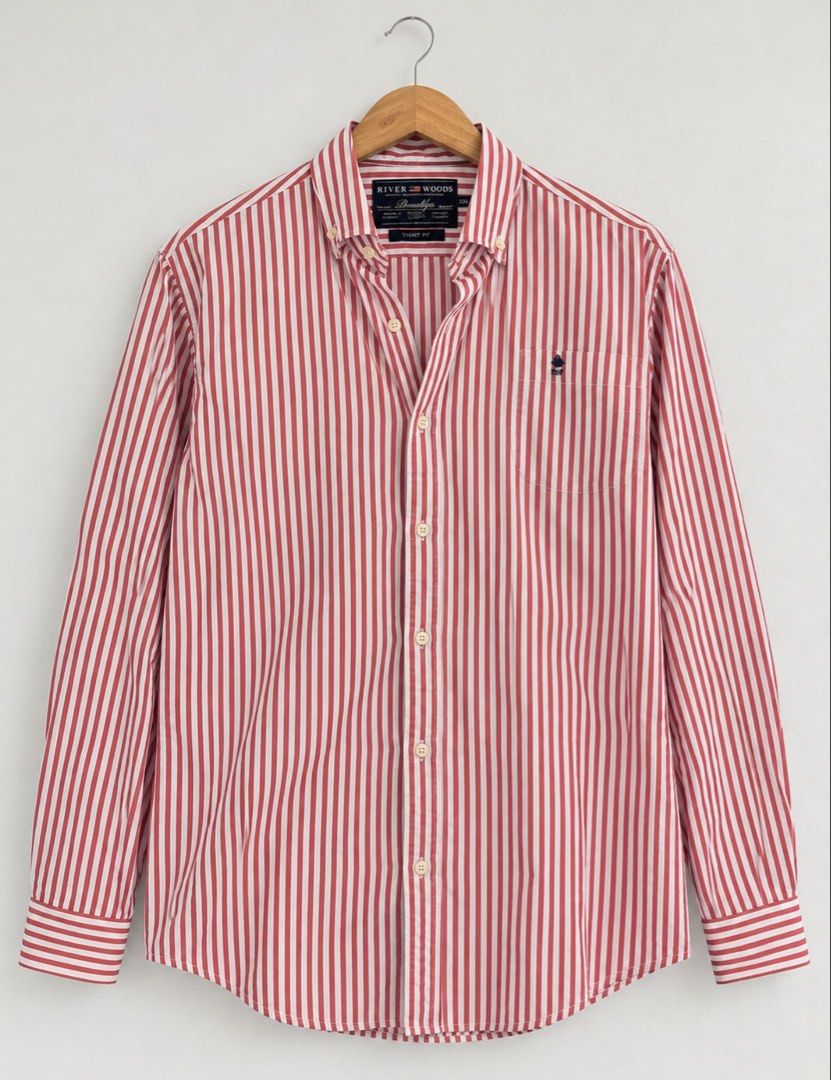 River Woods Red White Striped Long Sleeve Button Down Shirt (Category: Formal Shirts) located in Manila. Submitted by justmarkeeh (Listing ID 1467221269, Image 1). Description: - Brand/Style: River Woods long sleeve button-down shirt - Pattern: Red and white vertical stripes - Details: Button-down collar, chest pocket with small embroidered logo, structured cuffs, and curved hem - Fit: Classic fit - Condition: Clean piece, great casual staple.