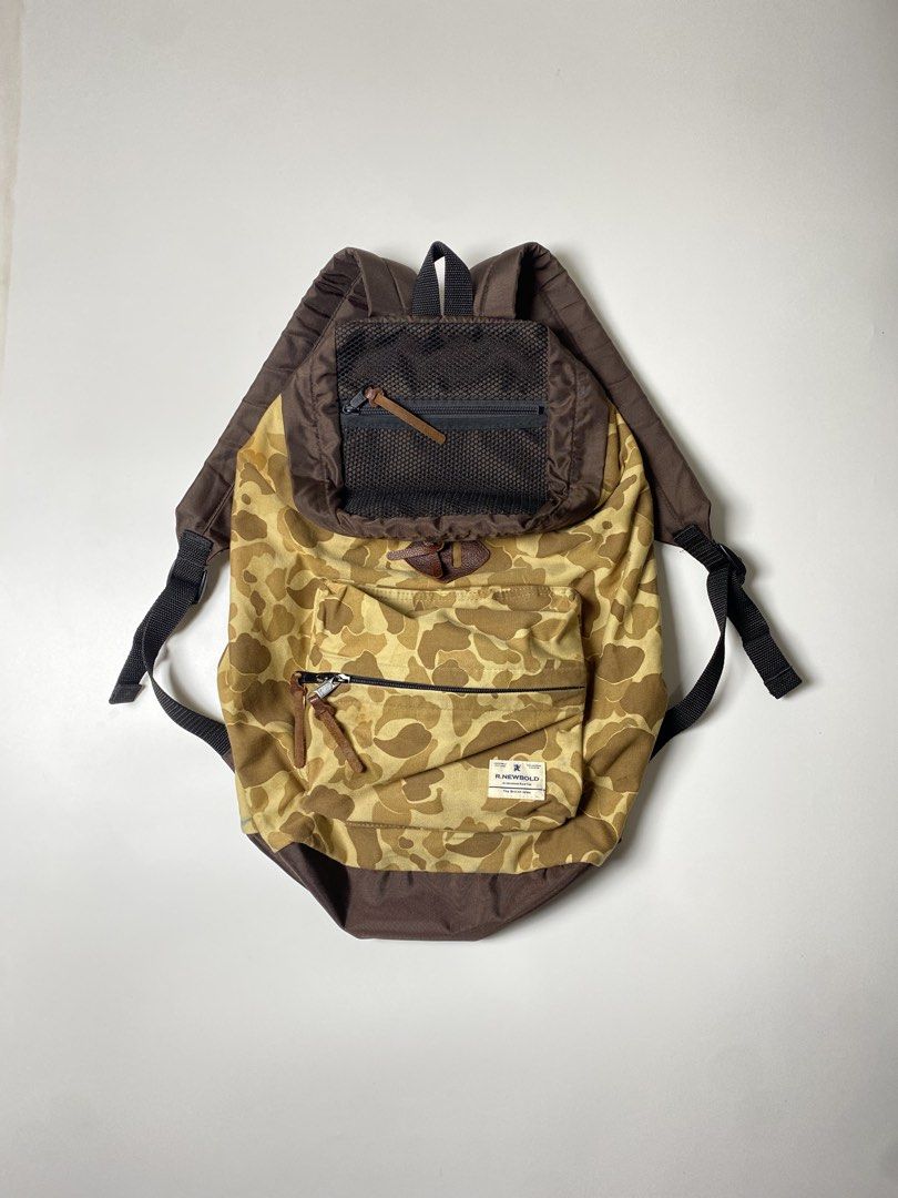 r.newbold FROGSKIN CAMO BACKPACK (Category: Backpacks) located in Balanga. Submitted by faded_garmz (Listing ID 1467280042, Image 1). Description: R.NEWBOLD FROGSKIN CAMO BACKPACK R.Newbold emerged in Japan in 1994 from a creative collaboration between British designer Paul Smith and Japanese designer Naoki Takizawa (Former Creative designer of ISSEY MIYAKE). The label embodies a distinctive dialogue between British heritage and Japanese experime
