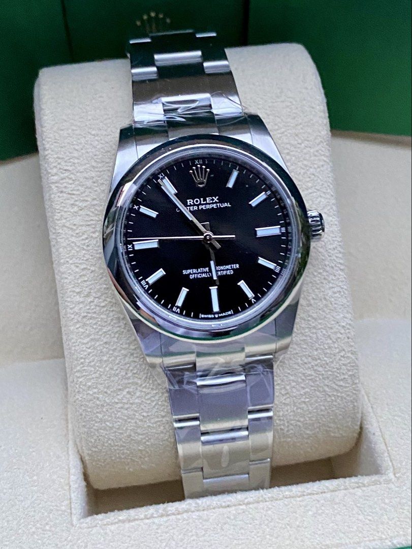 Rolex Oyster Perpetual 34 (Category: Luxury Watches) located in Las Pinas. Submitted by luxetrendph (Listing ID 1467255241, Image 2). Description: Rolex Oyster Perpetual 34 Black Dial on Oyster Bracelet Reference 124200 Like New Condition Complete Set Under Rolex International Warranty Year 2022 Php 388,000 Open to trade with selected timepieces. Authentication always welcome..