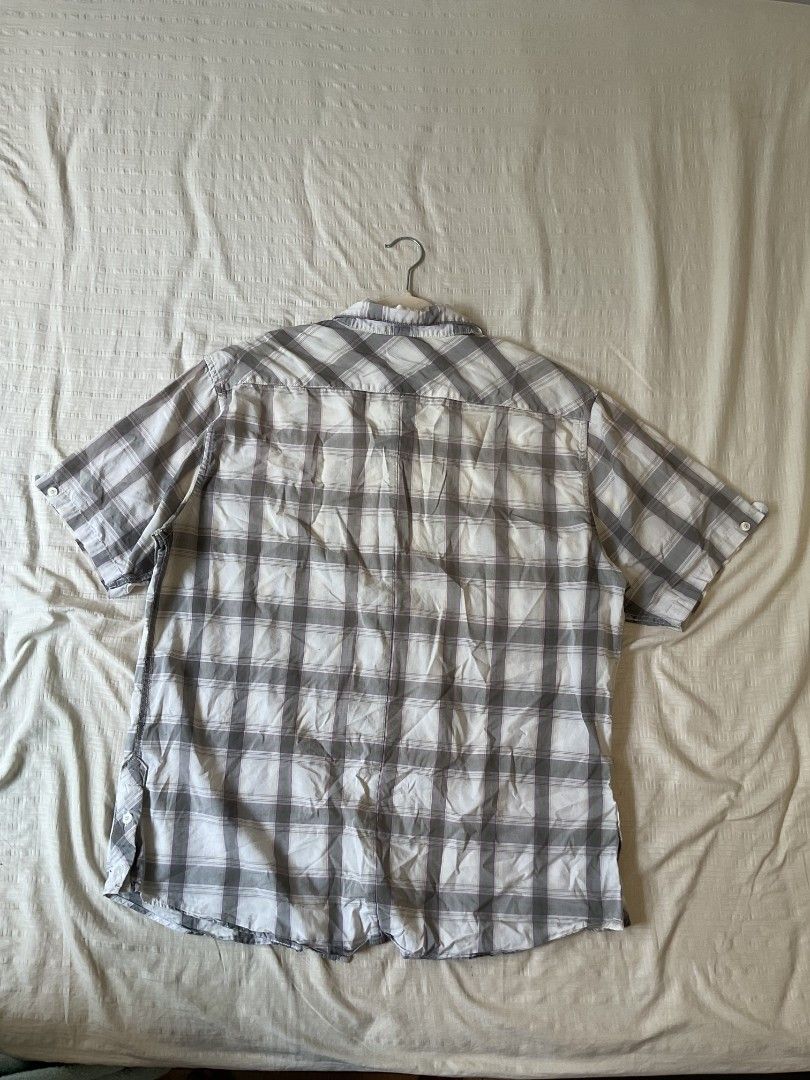 RVCA checkered button up (Category: Tshirts & Polo Shirts ) located in Calamba. Submitted by _.anjelis (Listing ID 1467337085, Image 1). Description: dimes width 24 length 30 issue: yellow stains.
