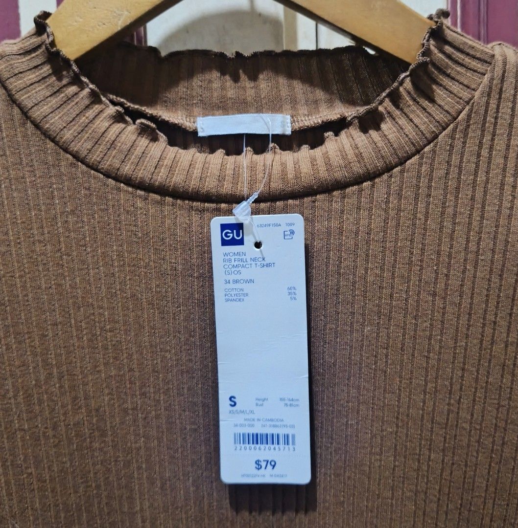 (S-3XL) GU NWT Brown Ribbed Top (Category: Shirts) located in Quezon City. Submitted by ginghamgirlie (Listing ID 1467267964, Image 3). Description: SIZE ON TAG: S BEST FITS: S-3XL MEASUREMENTS chest: 34-48 inches length: 23 inches 📌 PLEASE NOTE • Sizing is based on the actual measurements of the garment, not the tagged size. • Pre-owned pieces may differ from the tagged size due to stretching, shrinkage, wear, alterations, or labeling inconsist