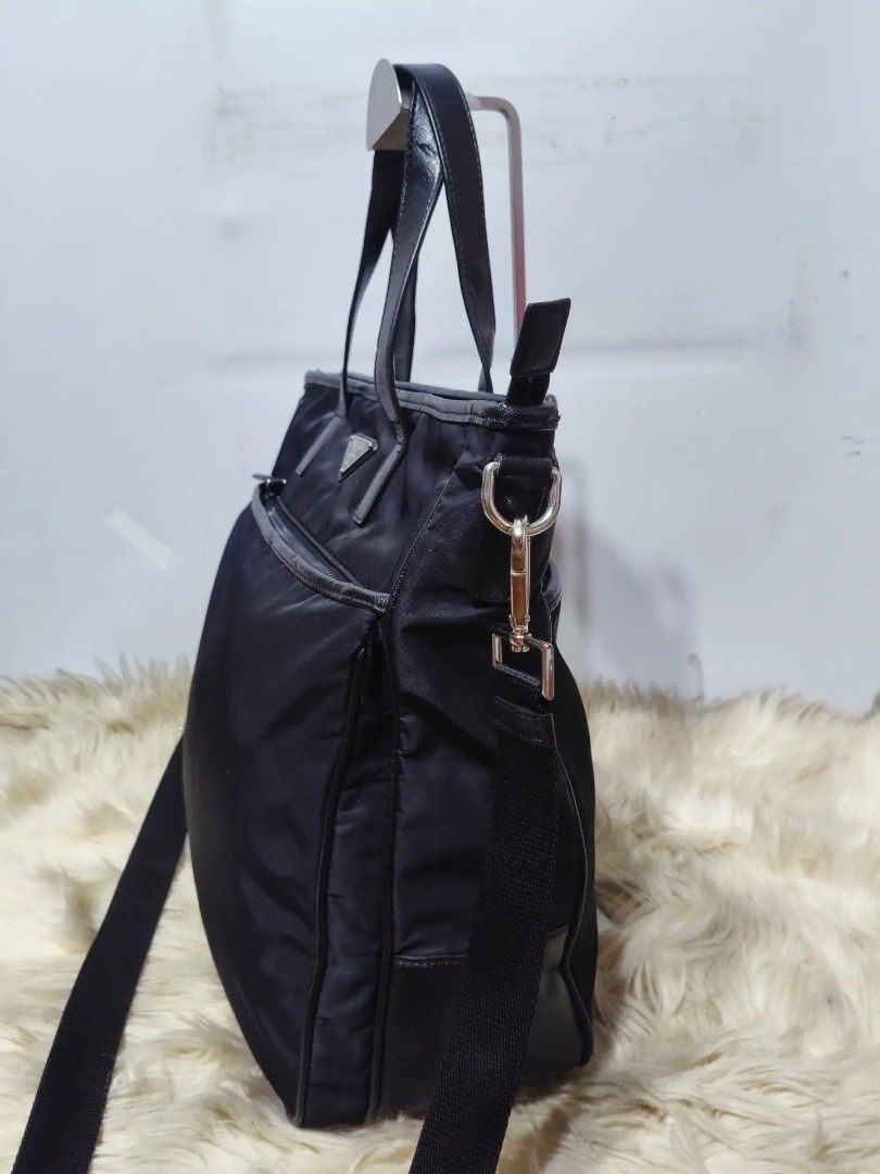 Sale! PRADA Bag (Category: Shoulder Bags) located in Caloocan City. Submitted by secondhand_shop2 (Listing ID 1467346561, Image 3). Description: Sale❗️Sale❗️Sale❗️ ₱ 2,899 PRADA Preloved Black LAMPO under zip Large - XL Nylon & leather trim 📌First to pay.