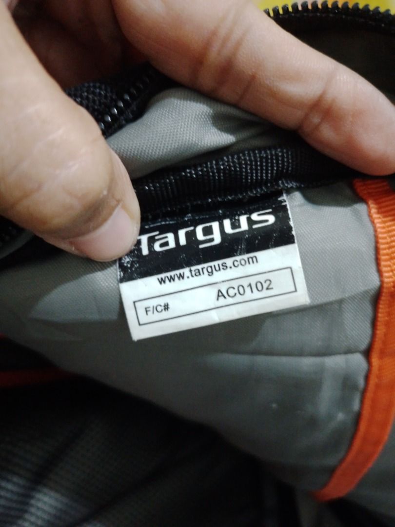 SALE! Targus Laptop Backpack Black Multi-compartment (Category: Backpacks) located in Imus. Submitted by bestfinds_yeth0724 (Listing ID 1467301403, Image 3). Description: - Brand: Targus - Color: Classic Black with vibrant orange interior accents - Compartments: Multiple zipped front and main compartments for easy organization - Pockets: Built-in mesh pockets to keep your items secure and tidy - Comfort: Padded back panel and fully adjustable sho