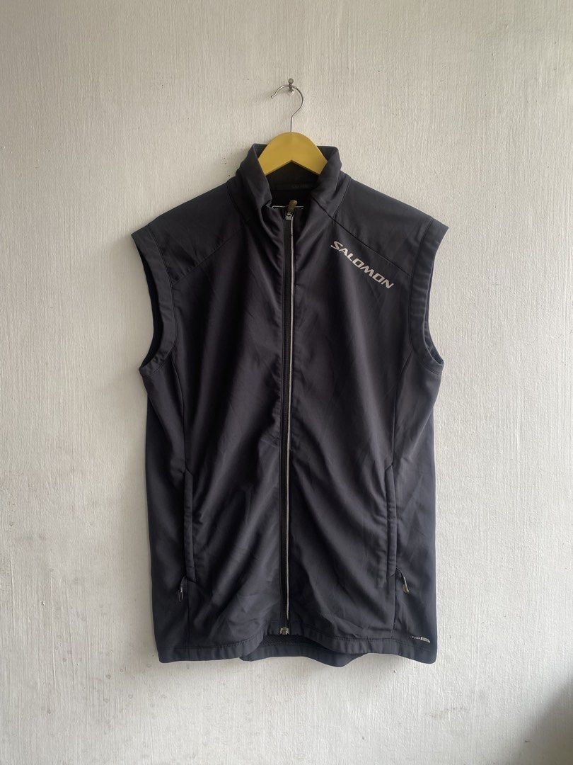 Salomon ClimaWind Black Athletic Vest (Category: Vests) located in Manila. Submitted by anthony1723 (Listing ID 1467193962, Image 1). Description: - Brand: Salomon - Style: ClimaWind Athletic Vest - Color: Dark grey with contrast side panels - Closure: Full zip front with stand-up collar - Pockets: Convenient zipper pockets on lower front and back - Branding: Salomon logo printed on left chest and back hem - Condition: Excellent, highly-rated sel
