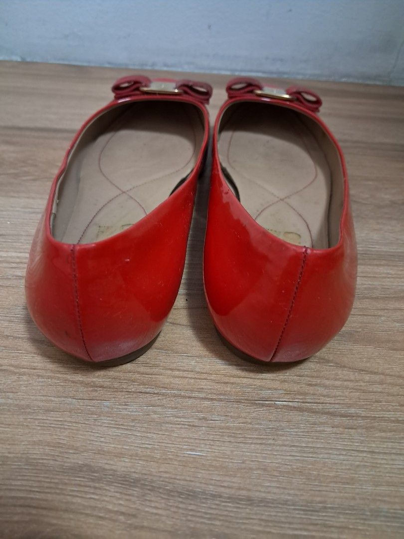 Salvatore Ferragamo (Category: Sneakers & Footwear) located in Muntinlupa City. Submitted by msshoppingera (Listing ID 1467223816, Image 3). Description: Salvatore Ferragamo red patent genuine leather flats. Size 39 All items are available unless marked as sold. Payment first before shipping. Shipping fees will be shouldered by the buyer. No return No exchange.