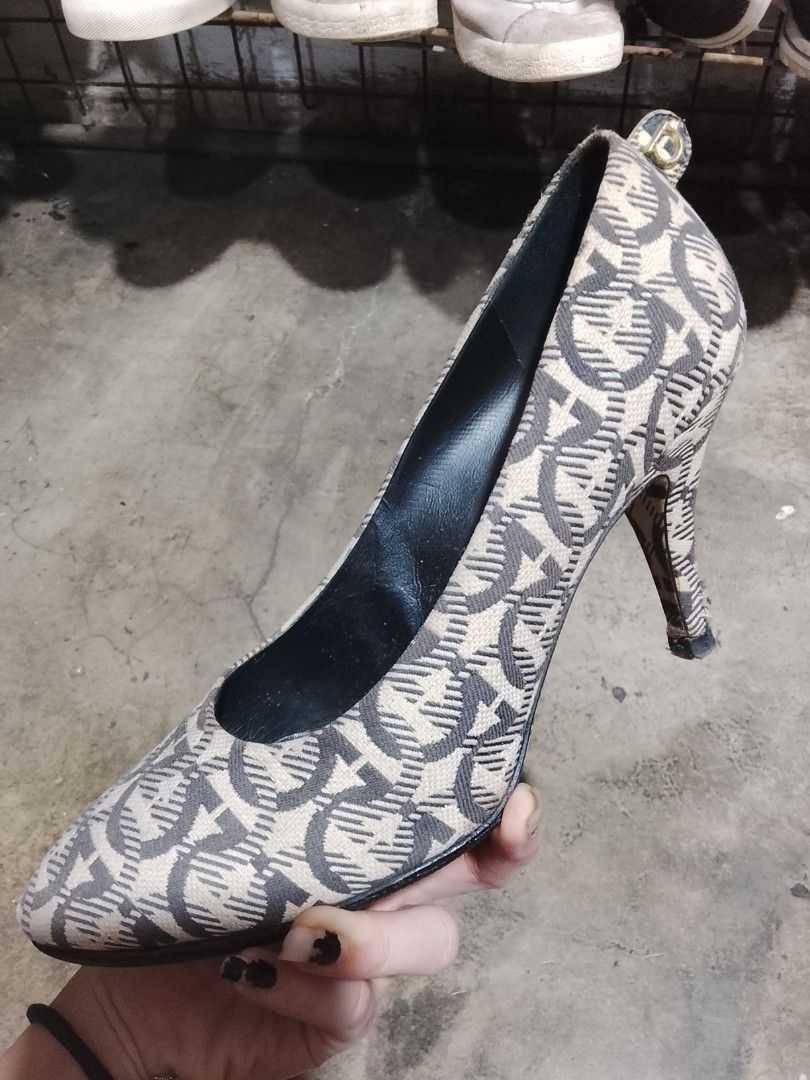Salvatore Ferragamo Monogram Canvas Heels (Category: Heels) located in Tiaong. Submitted by cdoswan (Listing ID 1467295818, Image 1). Description: !!HEARING OFFERS!! SIZE 9 - Brand: Salvatore Ferragamo - Style: Classic stiletto pump with pointed toe - Material: Beige and black monogram canvas with black leather inner lining - Details: Branded insole, high heel design - Flaws: Heel wrap shows heavy wear and damage on the fabric - Perfect for budge
