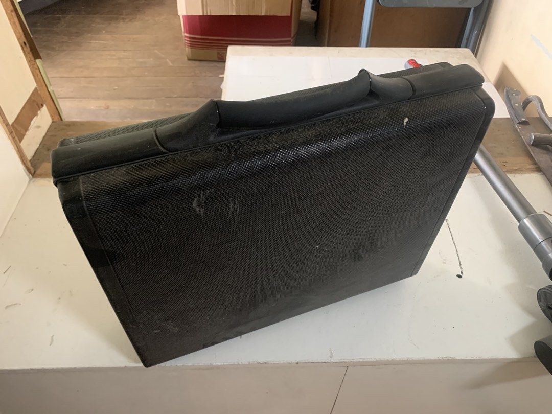Samsonite Hard Shell Business Briefcase (Category: Briefcases) located in Quezon City. Submitted by 47thclothing (Listing ID 1467229122, Image 1). Description: - Brand: Samsonite - Color/Finish: Black textured hard shell - Security: Built-in combination lock handle - Interior: Organizational panel with pen holders, small storage compartments, and document pockets - Condition: Shows minor exterior scuffs, 100% functional - Best for: Office work, b