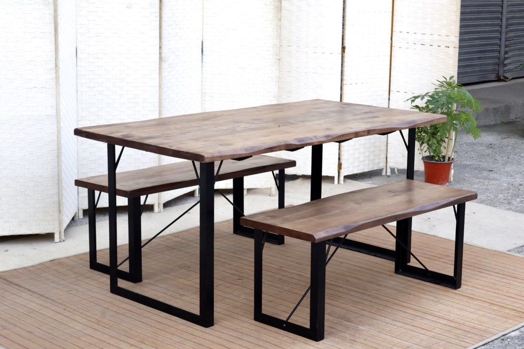 Sanka Japan Reno Dining Table with Two Benches (Category: Tables & Sets) located in Bulacan. Submitted by FurnitureGallery (Listing ID 1467310481, Image 3). Description: - Style: Industrial dining set (1 table + 2 matching benches) - Materials: Solid wood top with natural grain/oil finish and sturdy black iron legs - Features: Metal framing with diagonal support bars for extra stability JAPAN SURPLUS FURNITURE "Sankan Japan" HEAVY SOLID WOOD SLAB
