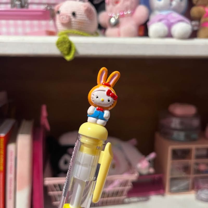 Sanrio Hello Kitty Rabbit Costume Stackable Pen (Category: Stationery & School Supplies) located in Manila. Submitted by janetecson05 (Listing ID 1467359021, Image 1). Description: - Official Sanrio collectible ballpoint pen - Features Kitty in an adorable orange rabbit hoodie on top - Clear barrel filled with cute stacked little animal figures - Bright yellow clip and writing tip - Authentic item with copyright dates marked on the bunny ears - P