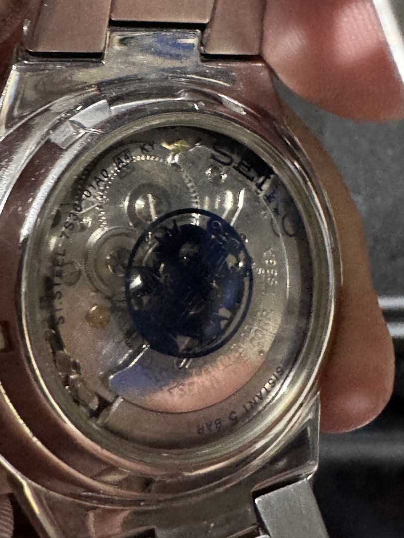 Seiko 5 Automatic “SNZB45” Blue Mosaic (Category: Men's Watches) located in Manila. Submitted by basilisk0816 (Listing ID 1467293514, Image 3). Description: - Textured black dial with silver numerals (6, 9, 12) - Convenient day and date window at 3 o'clock - Automatic movement with 23 jewels - 50 meters water resistance - Durable stainless steel bracelet with standard folding clasp - Cool exhibition case back showing the mechanical movement - Con