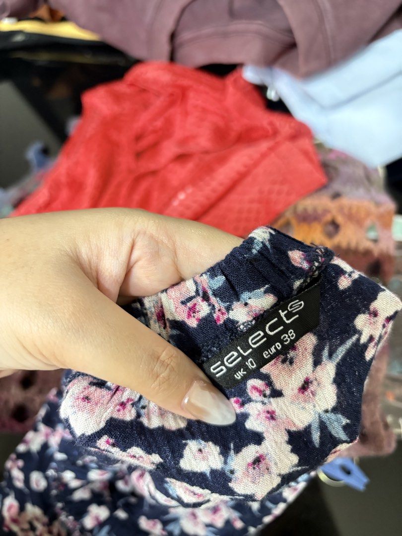 Selects Floral Off-Shoulder Top UK 10 (Category: Blouses) located in General Trias. Submitted by crissy9053136 (Listing ID 1467302942, Image 2). Description: - Style: Floral off-shoulder top - Color: Dark blue with pink and white flowers - Size: UK 10 / Euro 38 - Details: Short sleeves, stretchy neckline, lightweight fabric - Versatility: Easy to pair with shorts or skirts.