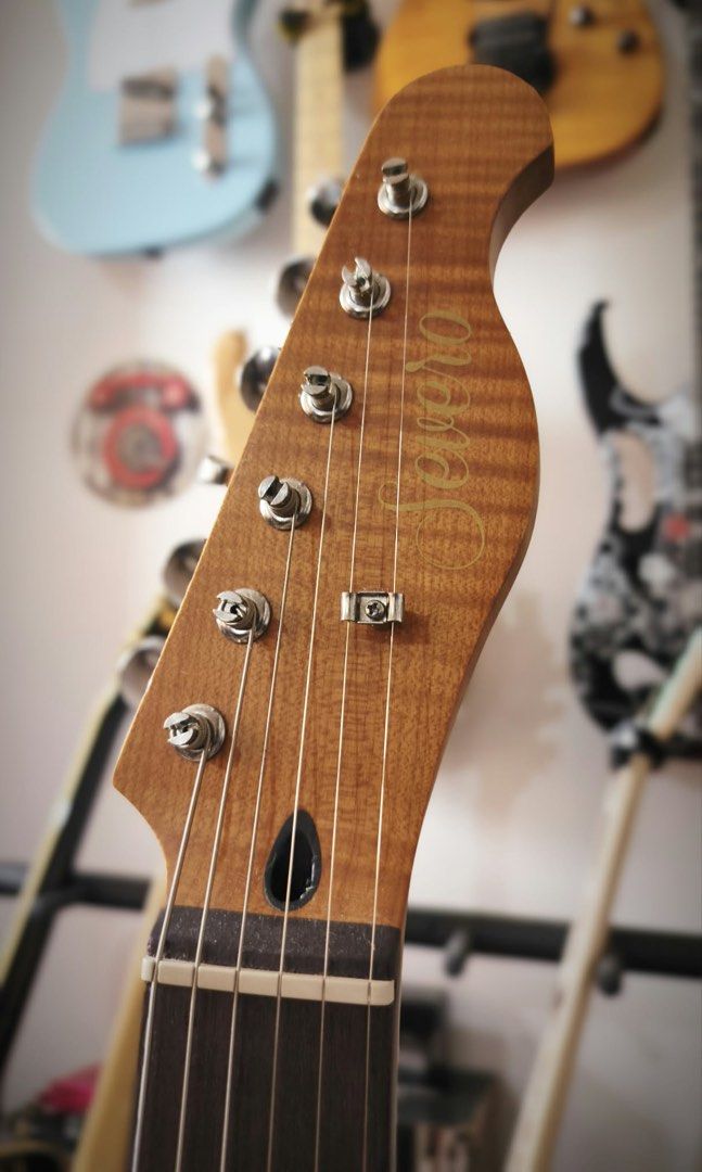 Severo Telecaster Complete Setup (Category: Musical Instruments) located in Manila. Submitted by bentaandco (Listing ID 1467342629, Image 2). Description: Severo telecaster 10k Complete set up New ernieball strings Pick up point cabuyao Specs: Body & Finish Body Type: Telecaster style Body Material: Poplar wood base with a Basswood veneer on the top and back Finish: Gloss Color: Maroon [1] Neck & Fingerboard Neck Material: Roasted Maple Neck Shap