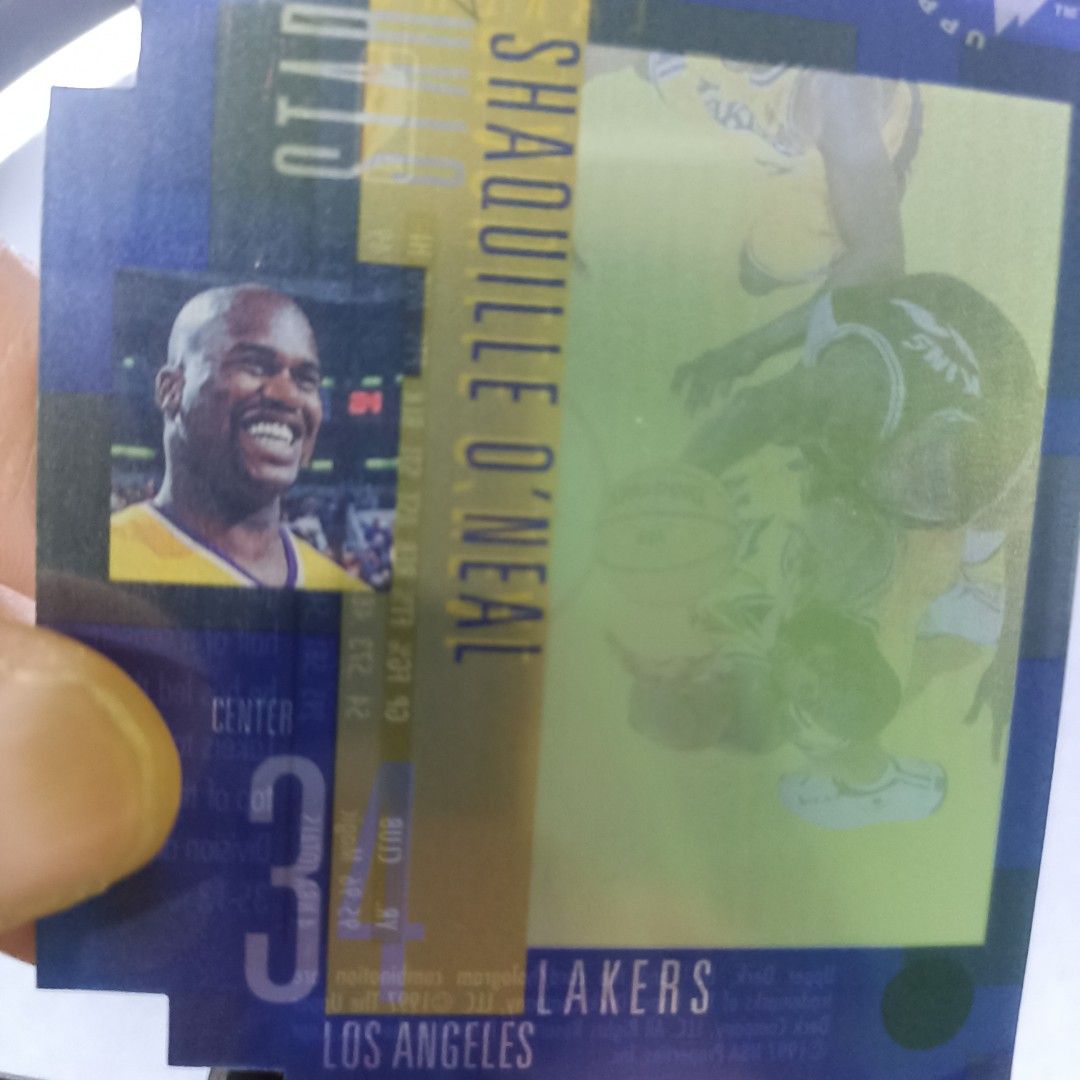 Shaquille O'neal (Category: Raw Singles) located in San Fernando. Submitted by leonsportscollectiblesandtcg (Listing ID 1467320770, Image 3). Description: Near mint to mint condition unless with stated major issue. Cards are raw. Print lines, minimal white corners and other minor issues do not make your purchase eligible for returns/refunds. Issues will be indicated. Please manage your expectation and do not expect all raw cards to gem especially