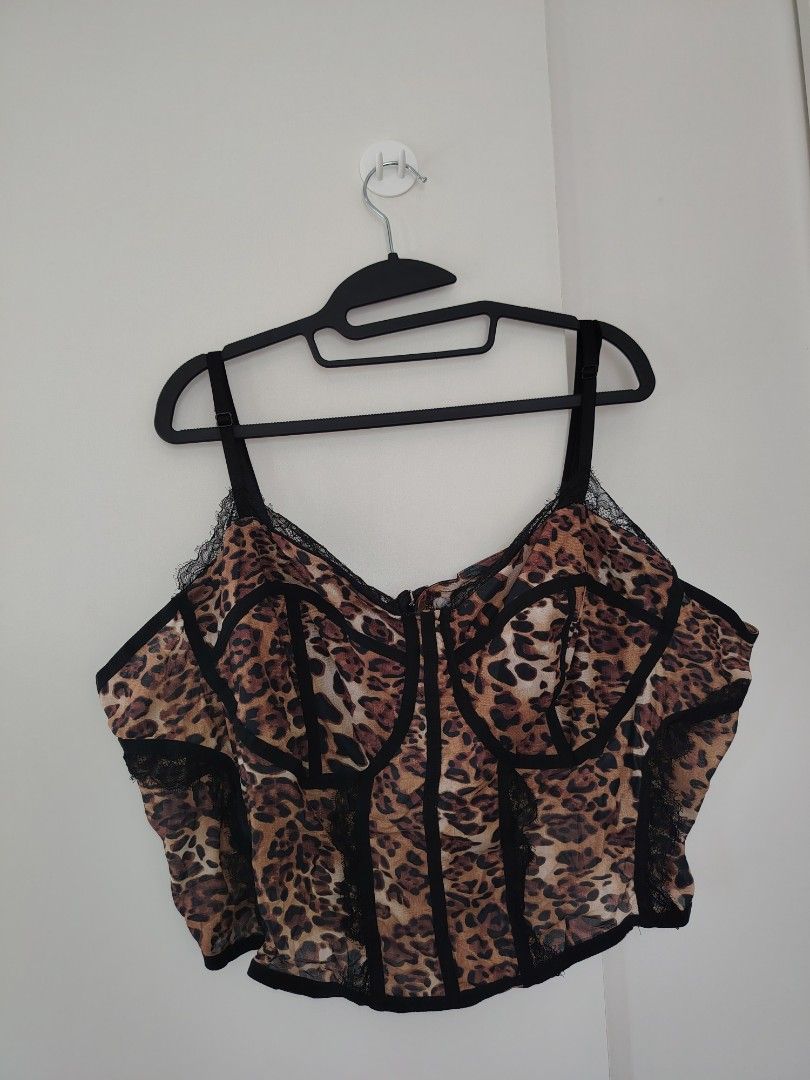 SHEIN BAE Plus Size Leopard Print Mesh Corset Top (Category: Sleeveless) located in Manila. Submitted by babeboxtheory (Listing ID 1467273350, Image 2). Description: - Brand: SHEIN BAE - Size: 7XL (Plus Size) - Design: Leopard print mesh fabric with elegant black lace trim - Structure: Built-in boning for support and shape - Closure & Straps: Hook-and-eye back closure with adjustable spaghetti straps - Material: 94% polyester, 6% elastane - Condi